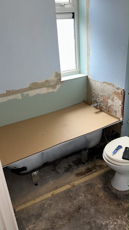 Bathroom during renovation with new fixtures